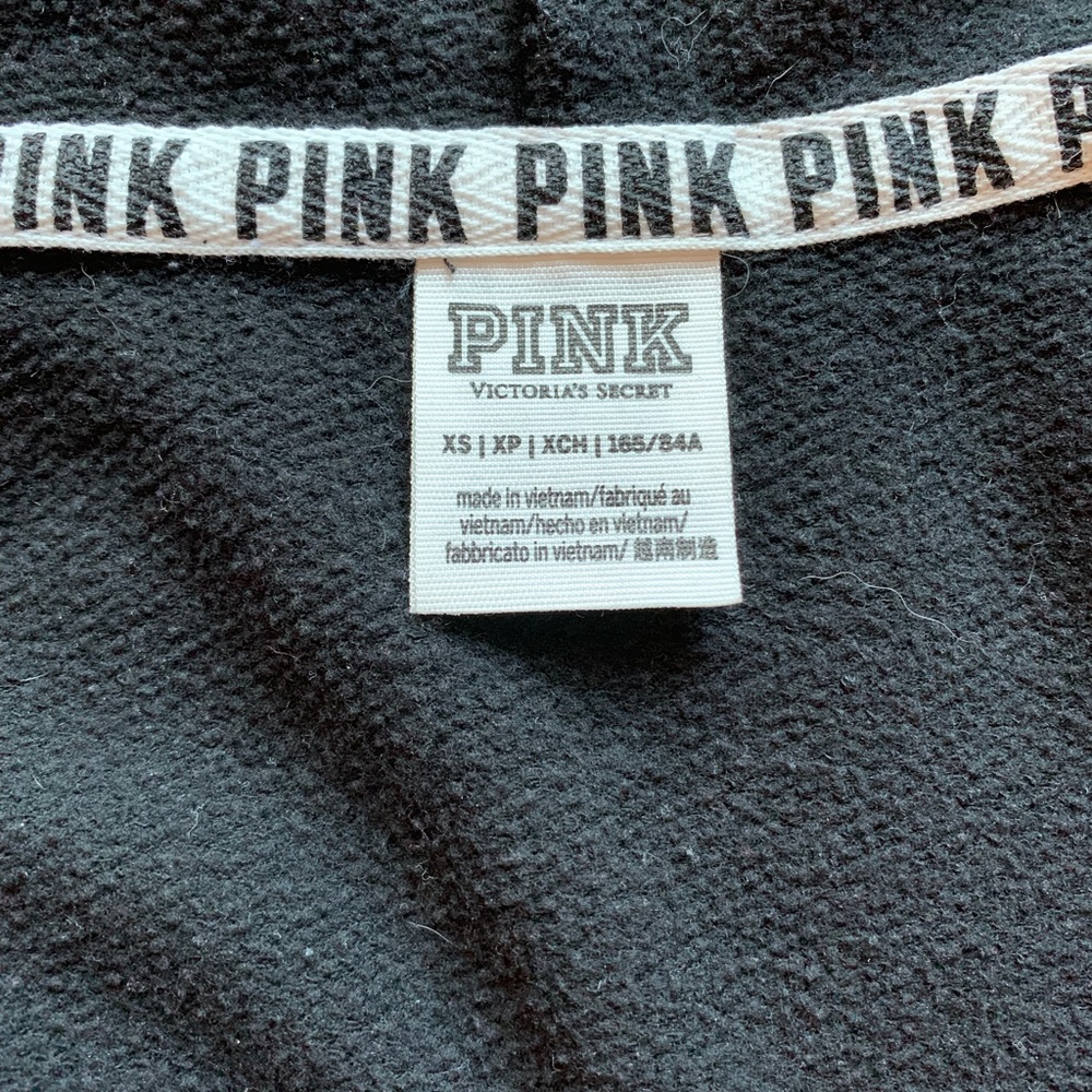 Black PINK zip up hooded jacket.